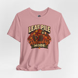 Pink T-shirt with leaf-pile “Recovery Mode” graphic centered on the chest