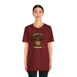 Maroon crew-neck T-shirt with pumpkin elixir front graphic
