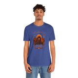 Blue crewneck t-shirt with orange sci-fi spice portrait graphic centered on chest
