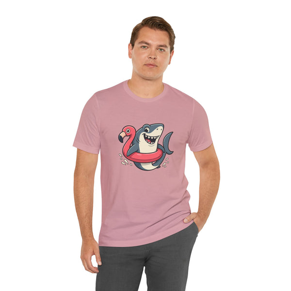 Pink short-sleeve crew-neck T-shirt with shark holding flamingo floatie graphic