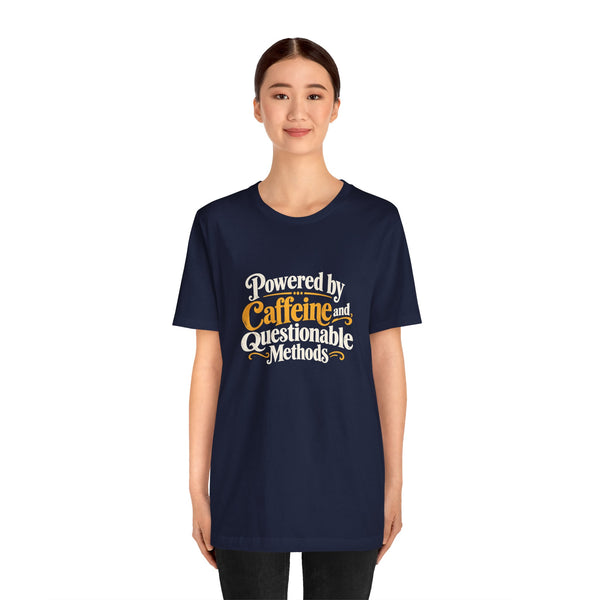 Navy crewneck T-shirt with multicolor “Powered by Caffeine and Questionable Methods” graphic