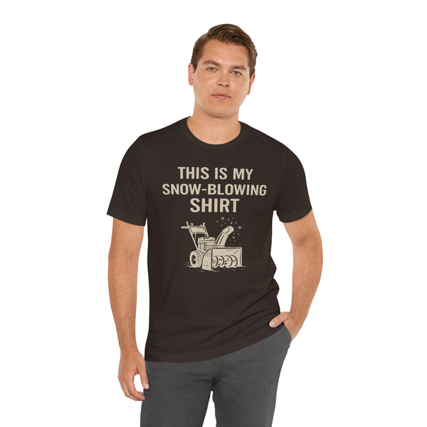Black crew-neck t-shirt with snow-blowing graphic and slogan, man wearing it
