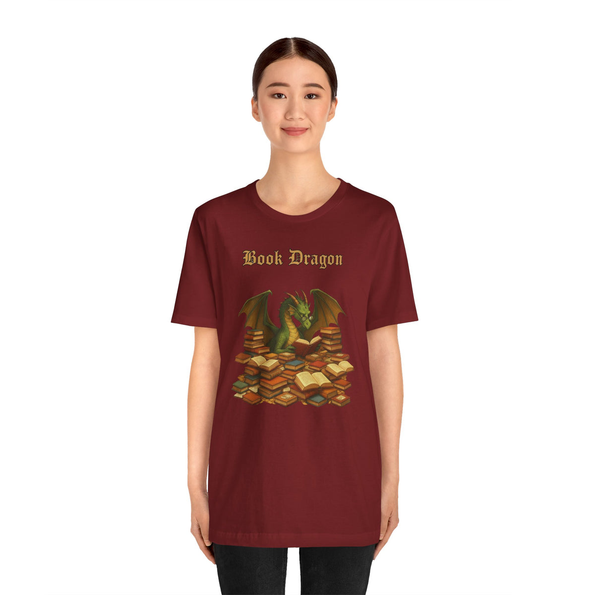 Burgundy crew-neck T-shirt with Book Dragon title and dragon reading books graphic