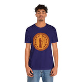 Navy crewneck T-shirt featuring round orange Greek-style figure graphic across chest