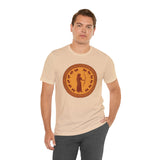Tan crewneck T-shirt with circular silhouette graphic print on the chest