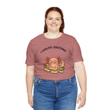 Rose heather short-sleeve T-shirt with “Axolotl Questions” axolotl reading graphic