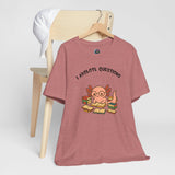 Dusty rose T-shirt on hanger with “I axolotl questions” axolotl reading graphic