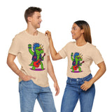 Adult tan graphic t-shirt with punk triceratops and red guitar, worn front view