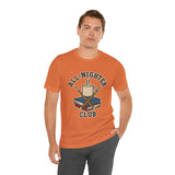 Orange crew-neck T-shirt with caffeine cup and books 'All-Nighter Club' graphic
