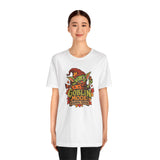 White crew-neck t-shirt with colorful goblin front graphic on a model