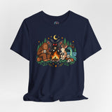 Navy crewneck t-shirt with colorful campfire cryptid graphic and starry forest accents