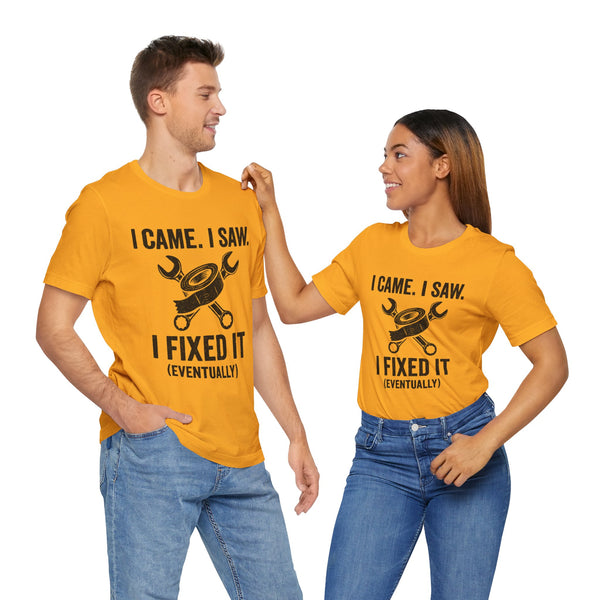 Two orange crew-neck T-shirts with black repair graphic and quote text, worn by models