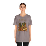 Gray crewneck T-shirt on model, front graphic of dragon surrounded by stacked books