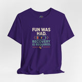 Purple short-sleeve t-shirt with “FUN WAS HAD” and “RECOVERY IS REQUIRED” graphic