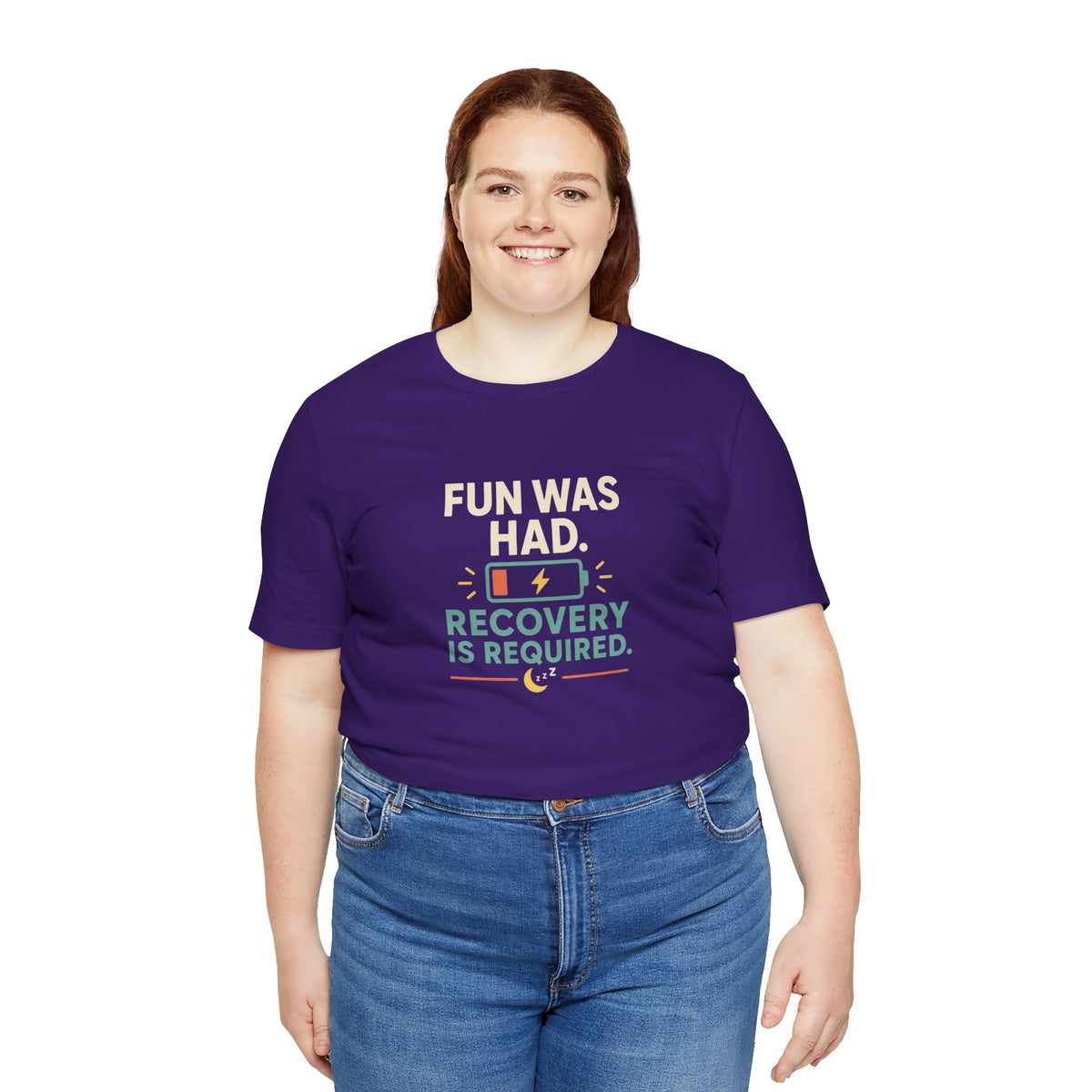 Purple crewneck t-shirt with centered “FUN WAS HAD” and “RECOVERY IS REQUIRED” print