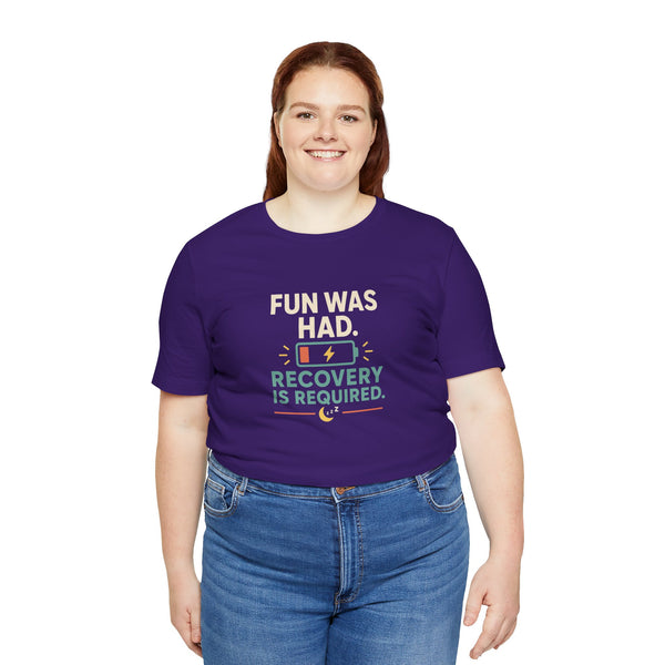 Purple crewneck t-shirt with centered “FUN WAS HAD” and “RECOVERY IS REQUIRED” print