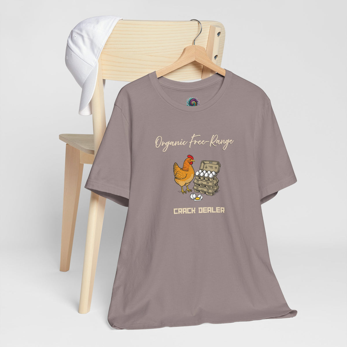Funny egg dealer chicken T-shirt on hanger, heather mauve with chicken and eggs print