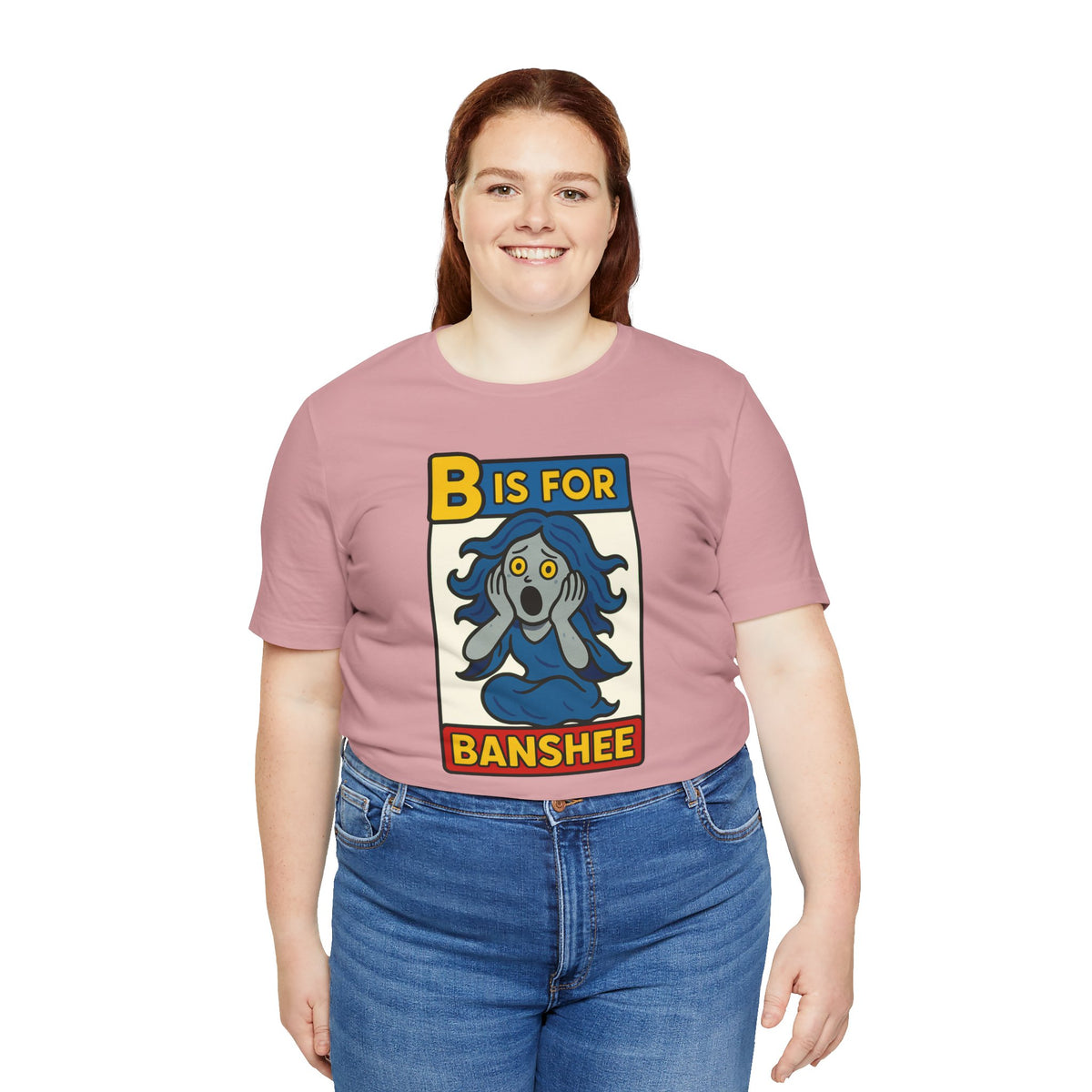 Pink t-shirt on model; “B is for Banshee” front graphic print.