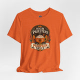 Orange crewneck T-shirt with “High Priestess of Pumpkin Spice” front graphic