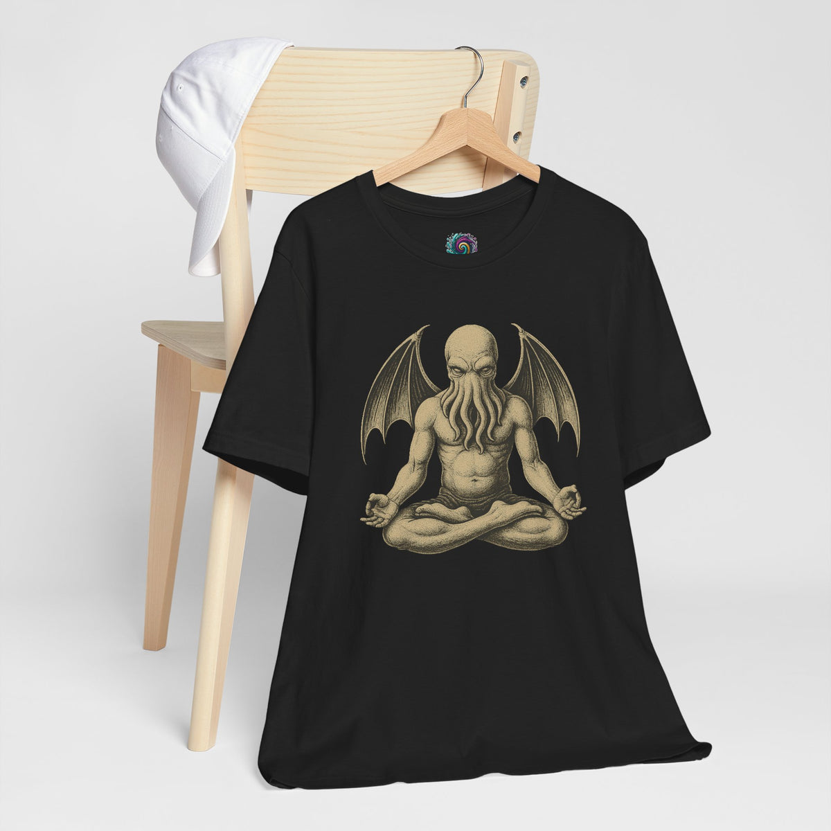 Black unisex crewneck T-shirt with meditating Cthulhu graphic on the chest