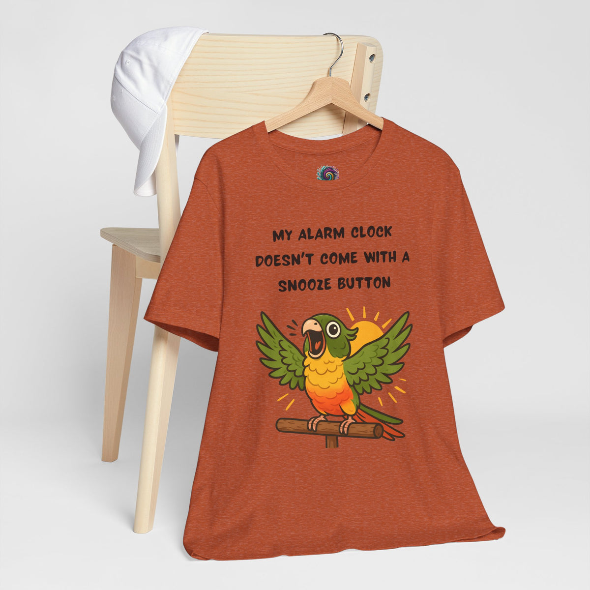Rust crewneck t-shirt with cartoon parrot and "MY ALARM CLOCK" "SNOOZE BUTTON" text.