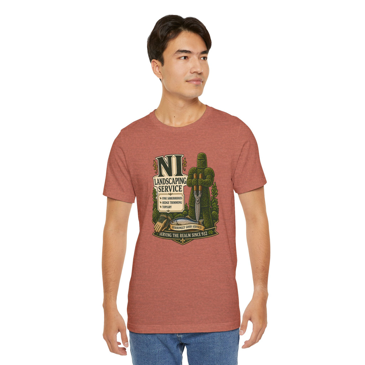 Rust-brown crewneck T-shirt with green cactus “NI Landscaping Service” graphic on chest