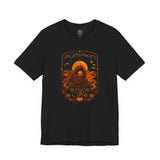 Black graphic T-shirt with orange “Pumpkin” sci-fi spice face print on chest