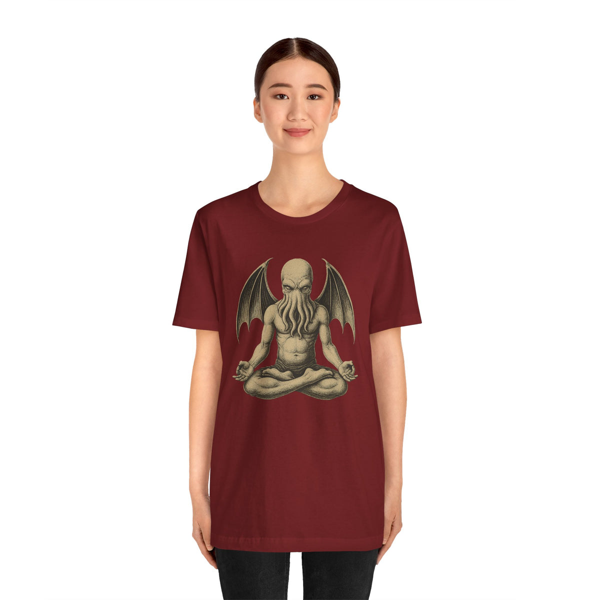 Unisex maroon crewneck T-shirt with meditating octopus-like creature graphic, front