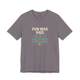 Storm gray crew-neck T-shirt with centered multicolor “FUN WAS HAD. RECOVERY IS REQUIRED.” print