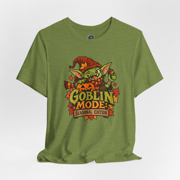 Unisex olive green t-shirt with “Goblin Mode” seasonal edition graphic on front.
