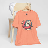 Coral short-sleeve T-shirt with shark and flamingo floatie front graphic
