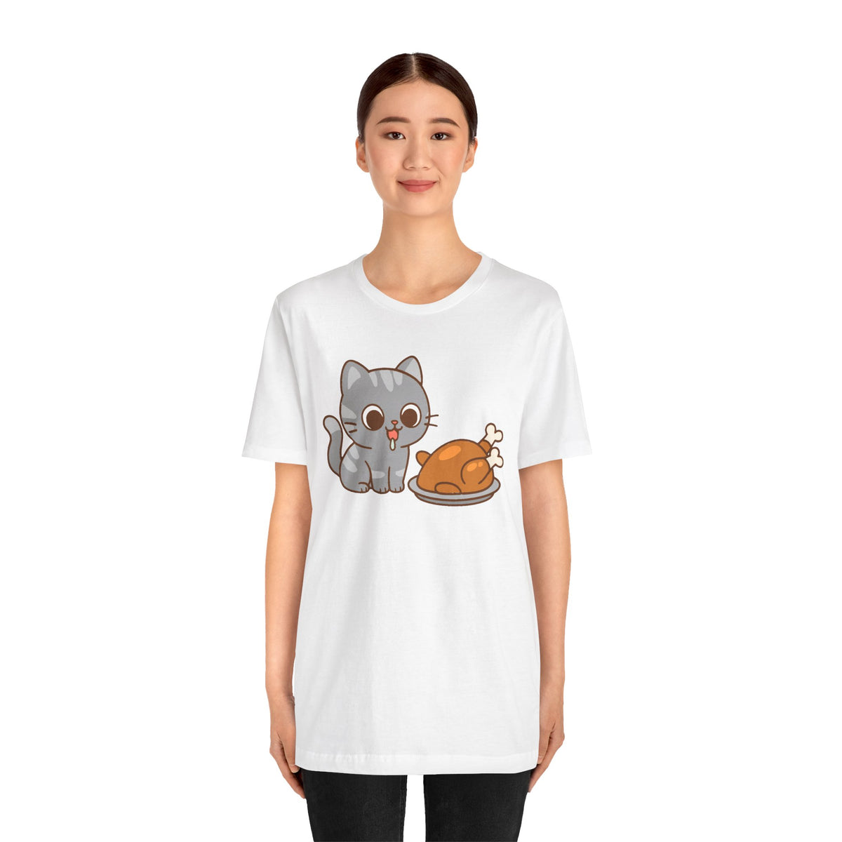 White t-shirt with centered cartoon cat and turkey graphic