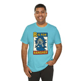 Turquoise short-sleeve T-shirt with “B is for Banshee” cartoon graphic on front