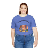 Blue crewneck T-shirt with axolotl reading book graphic, short sleeves
