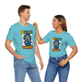 Turquoise T-shirt on couple, front graphic reads “B is for Banshee” with cartoon