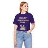 Purple crewneck short-sleeve T-shirt in profile with snow blower graphic and “THIS IS MY SNOW-BLOWING SHIRT”