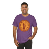 Heather purple crew-neck t-shirt with orange circular emblem on chest