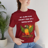 Red t-shirt on model, front parrot graphic with alarm slogan and “snooze button”