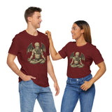Two unisex maroon crewneck T-shirts with meditating octopus-like creature graphic