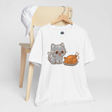 White t-shirt on hanger with cat and turkey illustration at center front