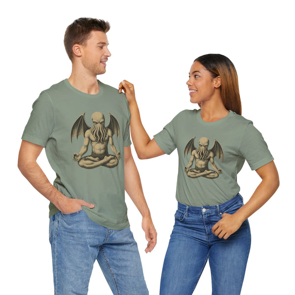 Two unisex graphic t-shirts in sage green with meditating Cthulhu-style chest prints