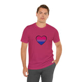 Pink crew-neck T-shirt with blue and pink pride heart graphic centered on chest