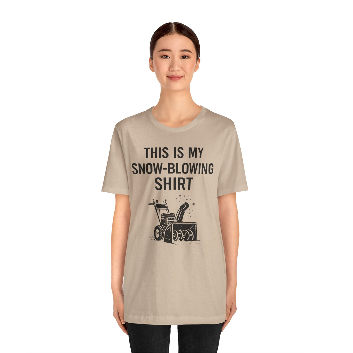 Tan crewneck T-shirt with “This Is My Snow-Blowing Shirt” text and snowblower graphic