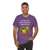 Purple crew-neck t-shirt with colorful parrot graphic and “snooze button” slogan