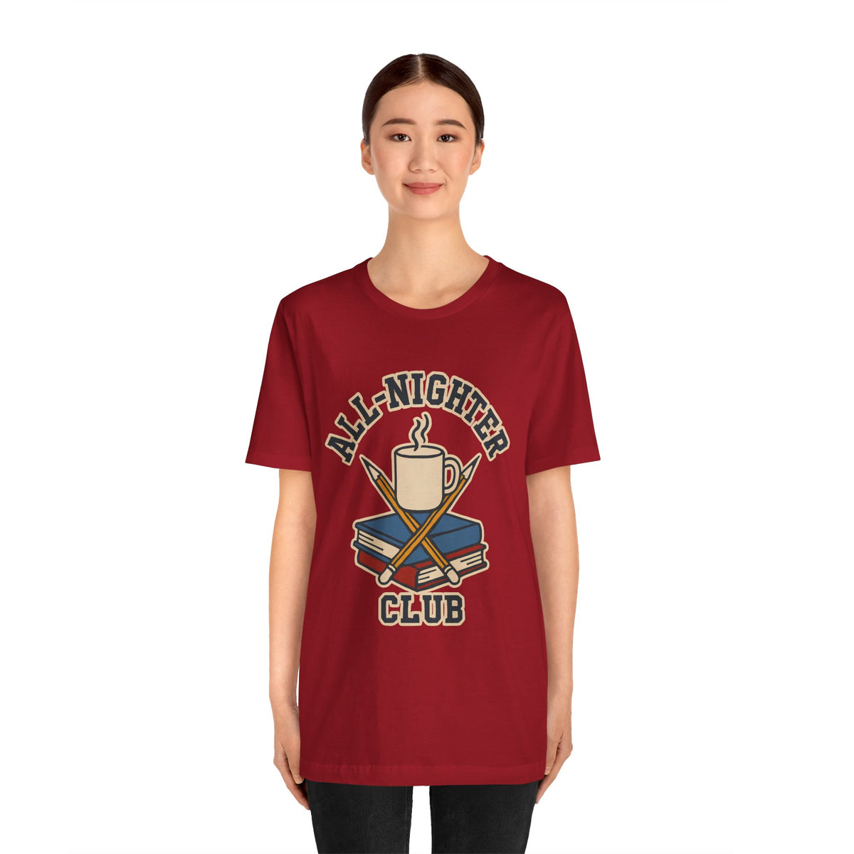 Burgundy crewneck T-shirt with “All-Nighter Club” coffee-and-books graphic