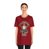 Burgundy crewneck T-shirt with “All-Nighter Club” coffee-and-books graphic