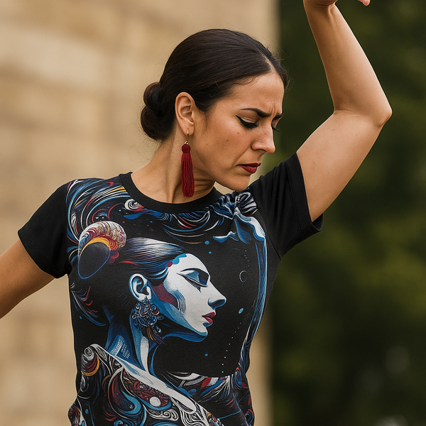 Black graphic t-shirt with colorful blue face art and red accents, crew neck short sleeves