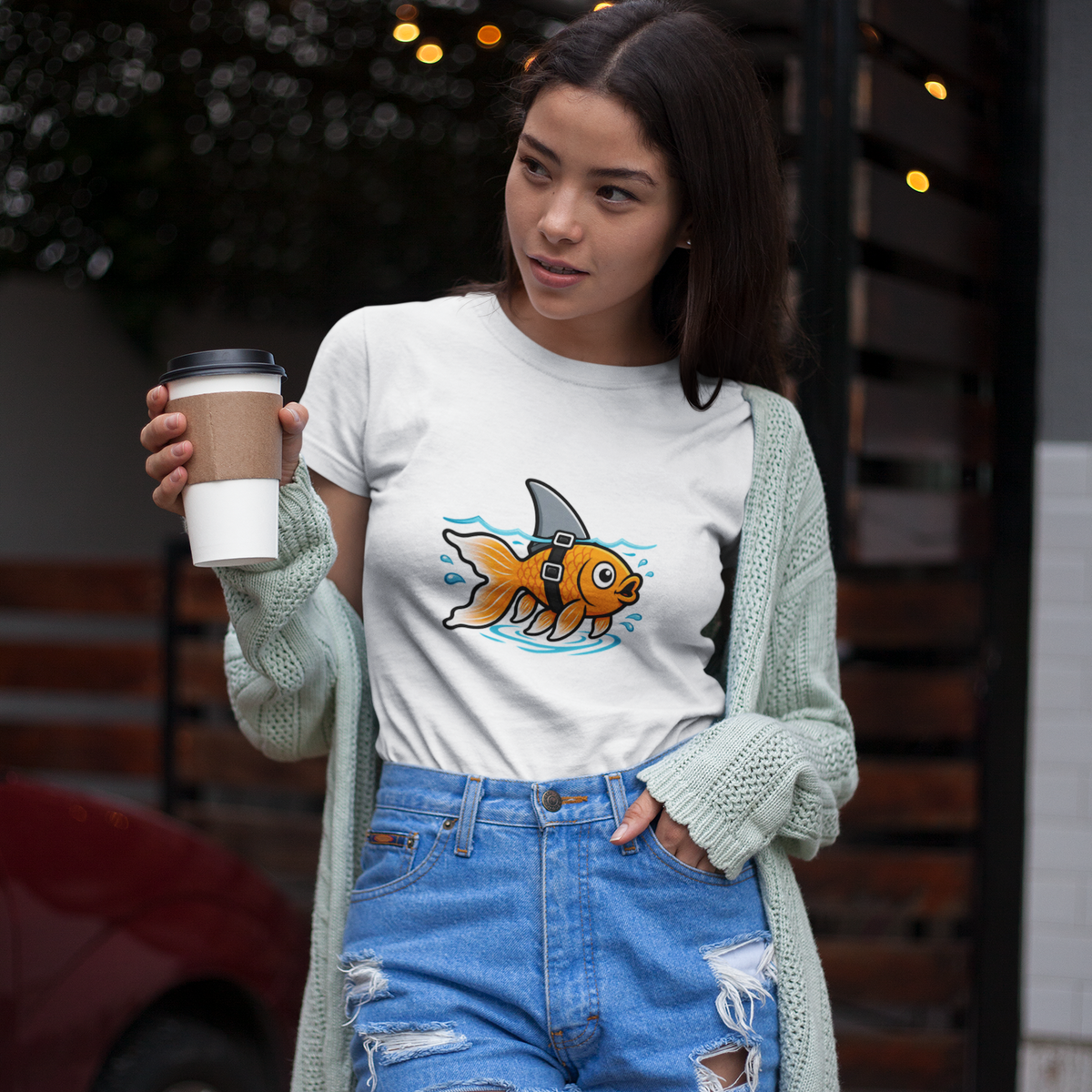 White crewneck T-shirt with goldfish-shark swimming graphic on front