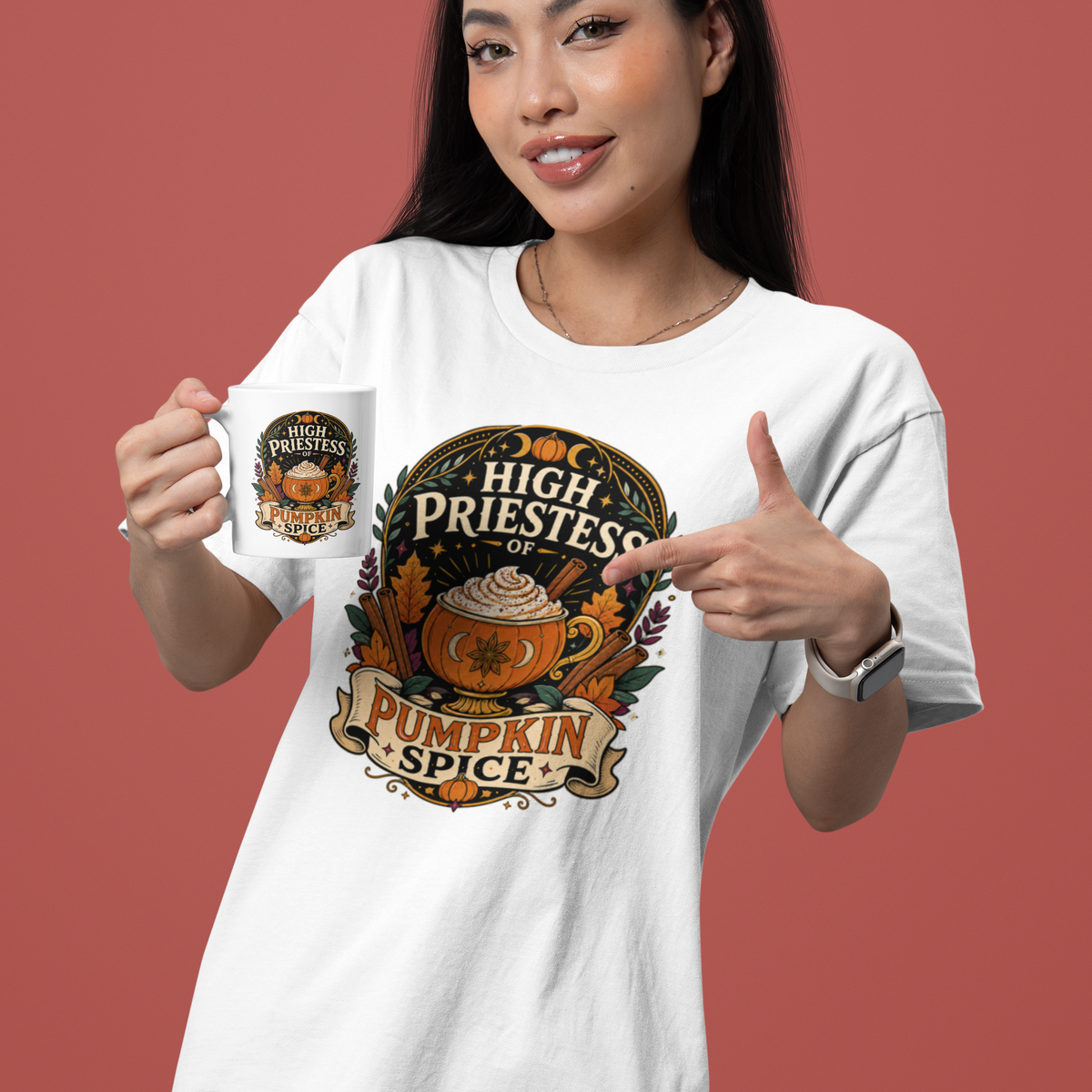 White T-shirt with pumpkin spice emblem graphic, model holding a coffee mug