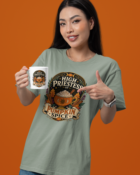 Sage green T-shirt with “High Priestess” pumpkin spice graphic on the front